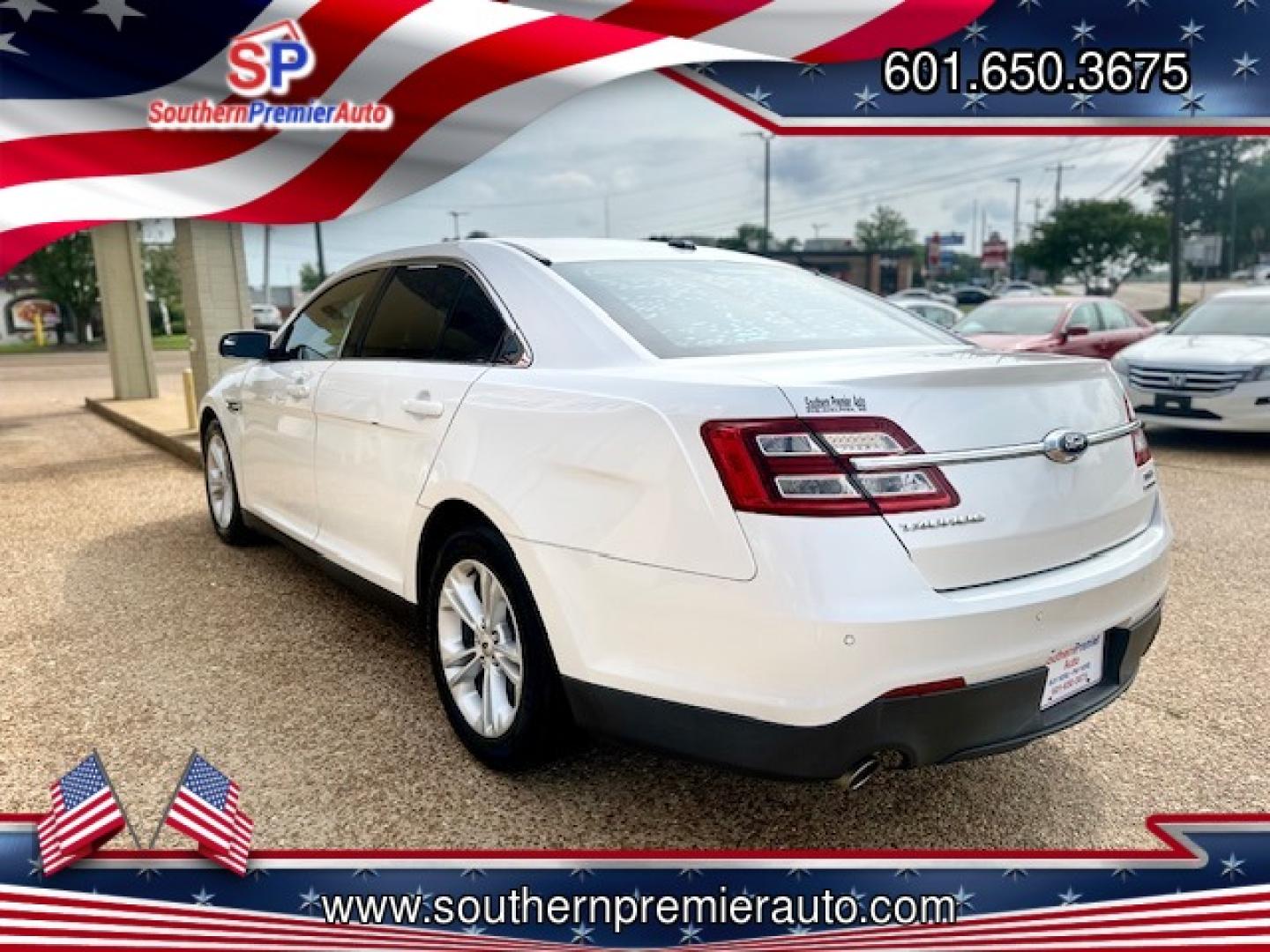 2015 WHITE FORD TAURUS SEL (1FAHP2E86FG) , located at 922 W. Beacon St., Philadelphia, MS, 39350, (601) 650-3675, 32.770447, -89.127151 - Photo#3